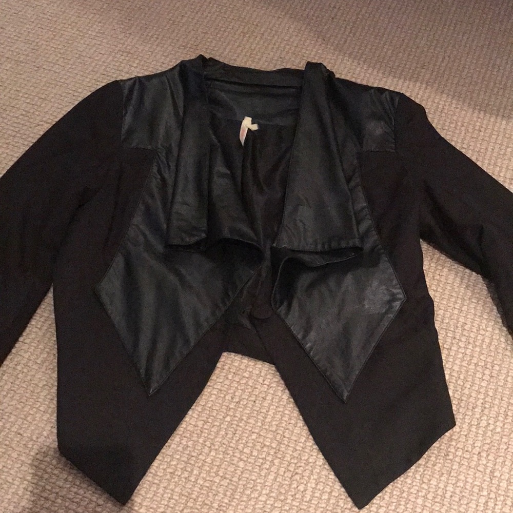Tuxedo style blazer with faux leather flaps